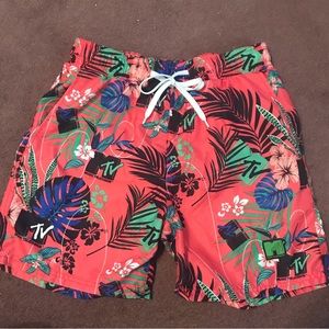 MTv Small swim trunks palms & foliage & Music M Tv logo on orange background